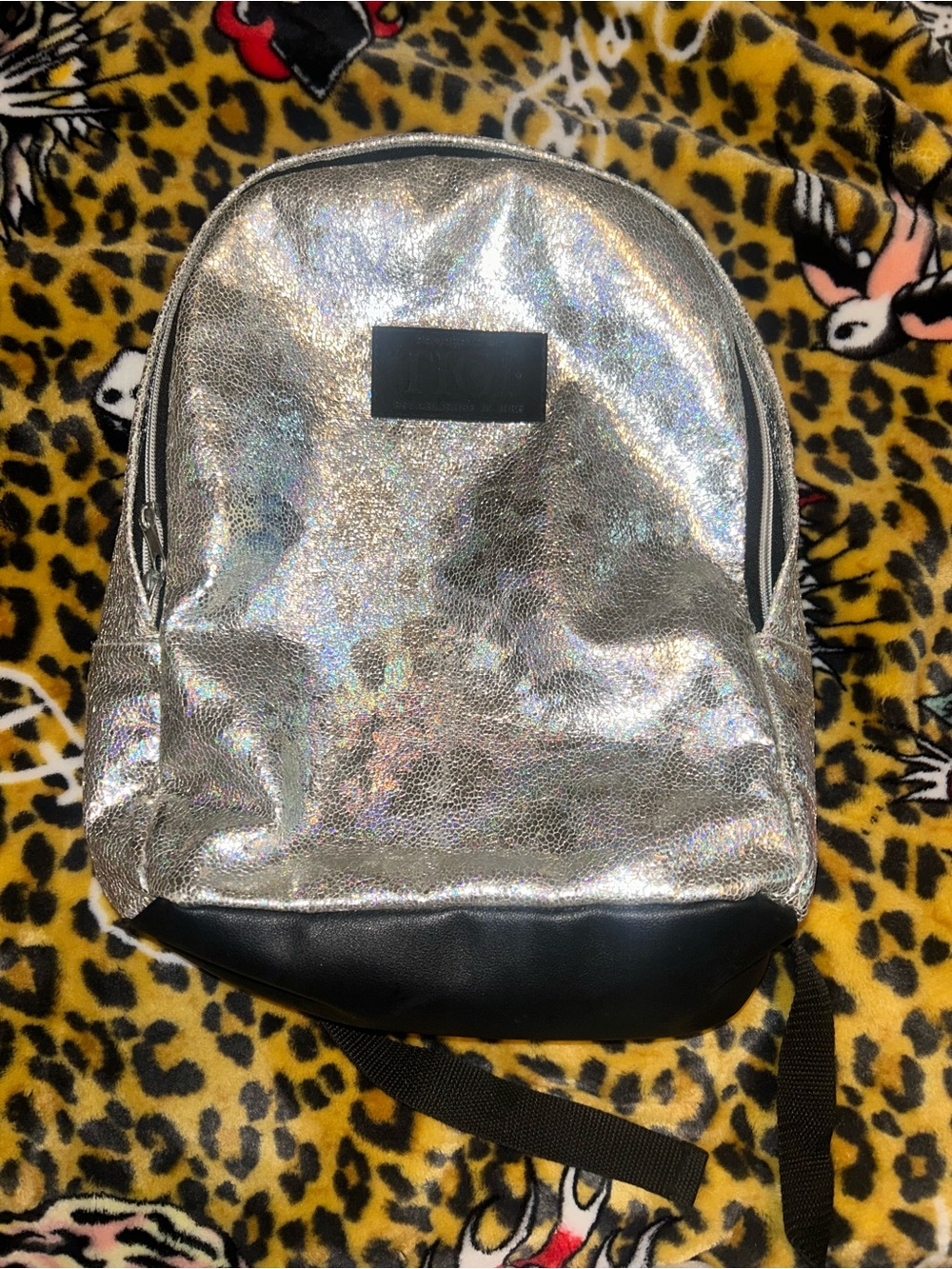 TIGI Holographic Silver Mini Backpack with Black Trim